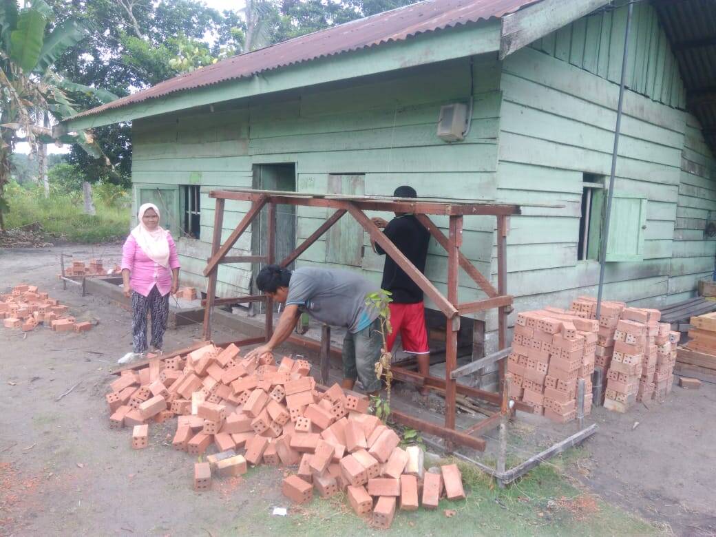 Rasa Senang Menghiasai Wajah Masitun Penerima Program Bedah Rumah